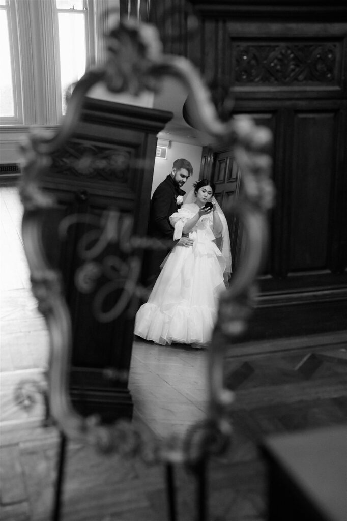 couples portrait in mirror at The Arts House Trust at Pah Homestead