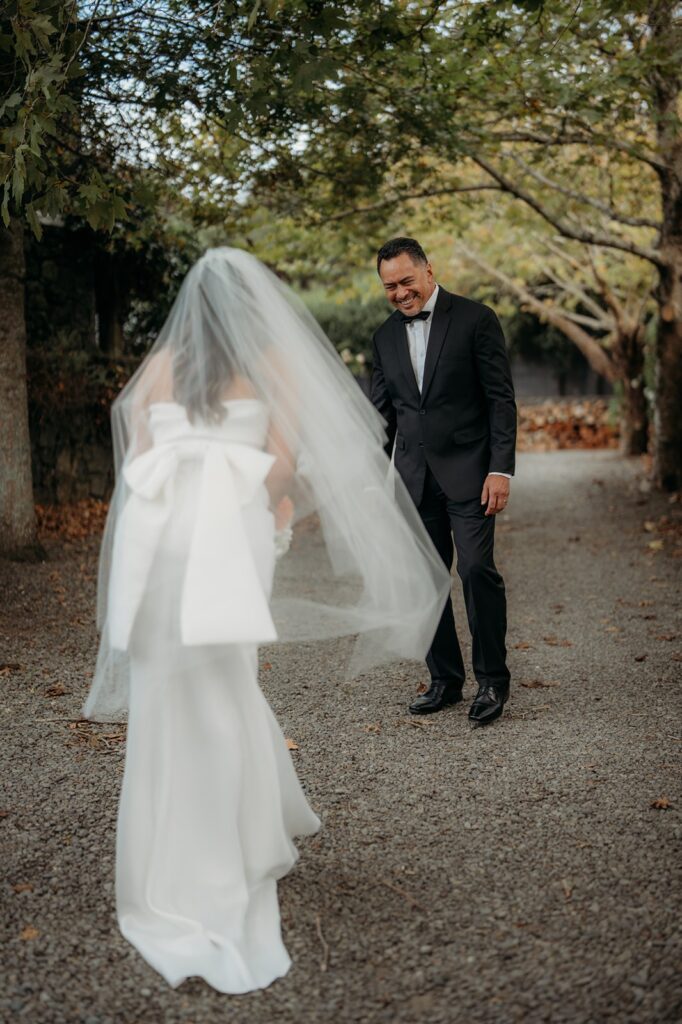 bride and groom first look at the hunting lodge wedding in auckland